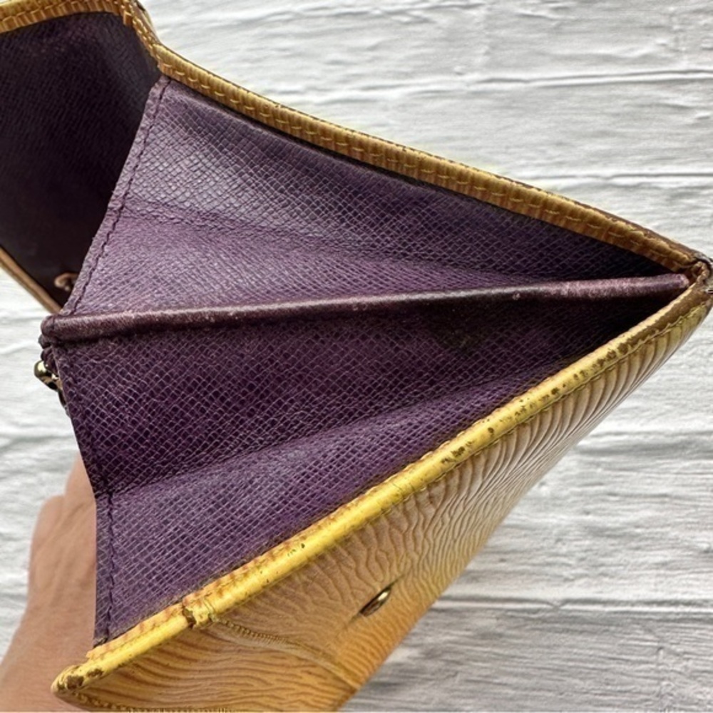 AUTHENTIC Louis Vuitton Epi Porte Tresor International wallet. Tassel yellow. - Picture 7 of 11